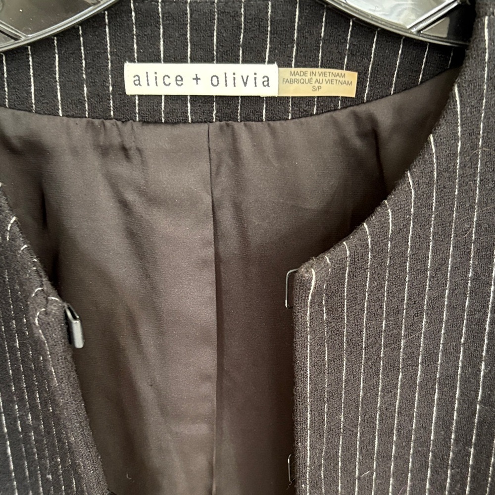 Alice + Olivia Charcoal Pinstripe Cape Jacket Arm Opening and leather detail tri